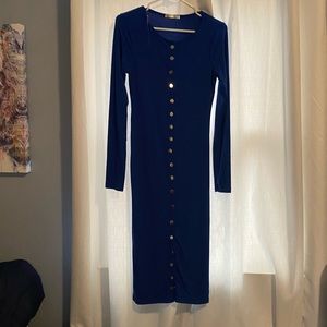 Classy, sexy and simply flattering! Cobalt blue dress with silver button details